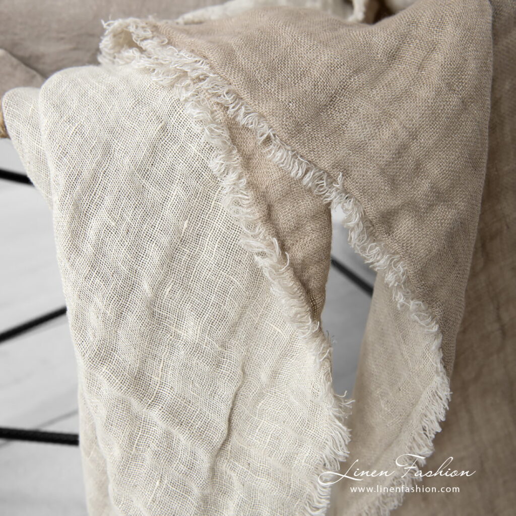 FARGO Plaid beige 4 Linen double side beige blanket with fringes around.