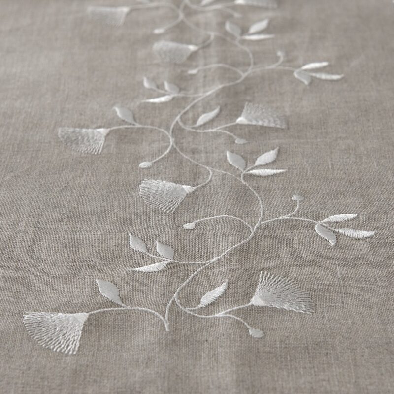floral motif stitching on natural linen