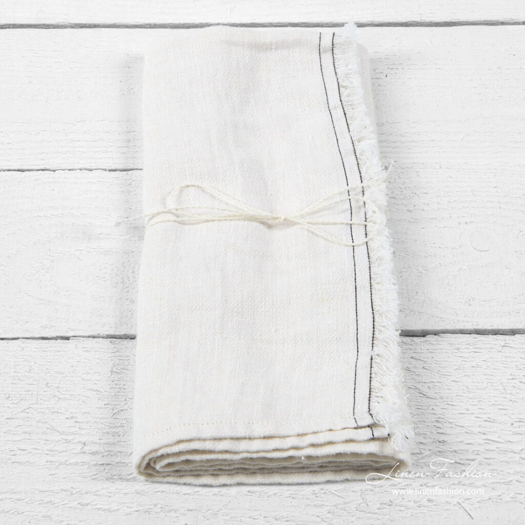 Küchentuch 10 2 White kitchen towel with brown stitches and loose fringes on one side