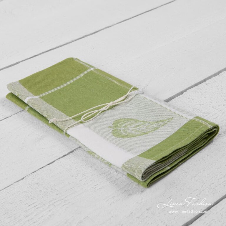 Kitchen towel in light green color.