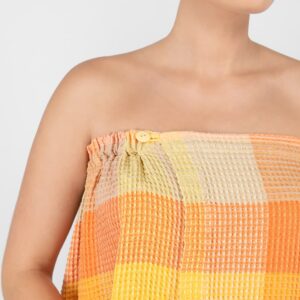BINGO Saunakilt orange 14 orange linen wrap towel, with button closure.