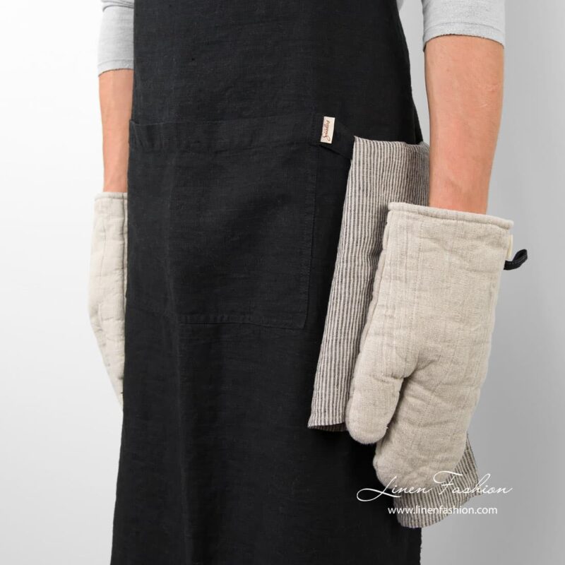 Black colored 100% linen apron.