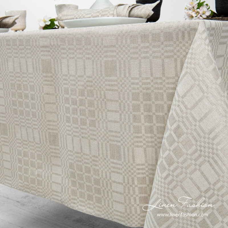 Light grey patterned linen tablecloth, simple hem
