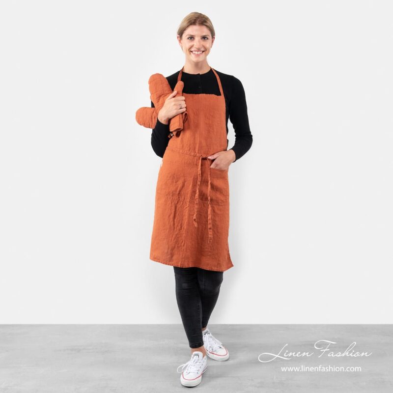 Orange colored linen apron, gamma.