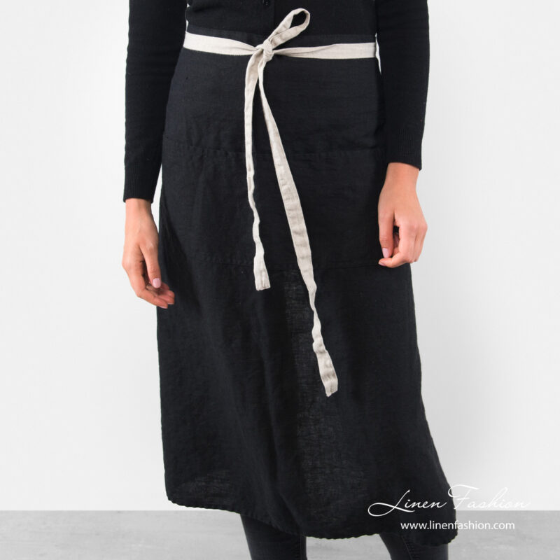 Long black linen apron with front pockets and gray waist tie