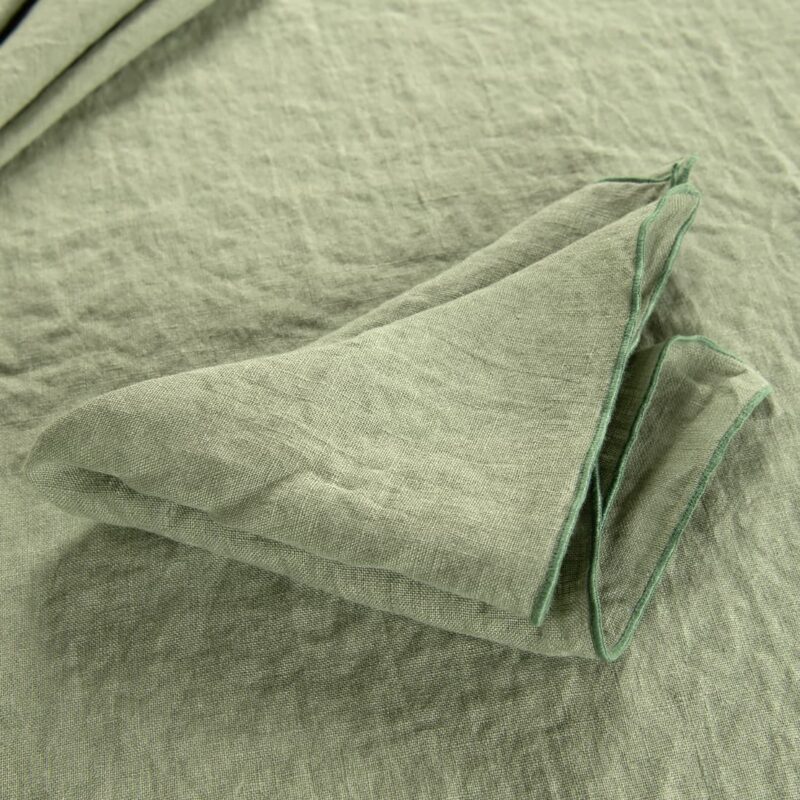 green linen napkin with babylock