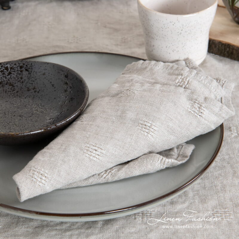 100% linen napkin in grey color, solo.