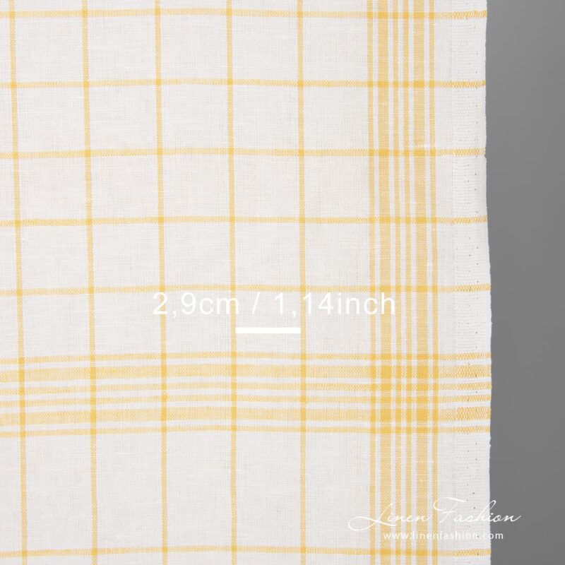White fabric with green checks narrow width close up view