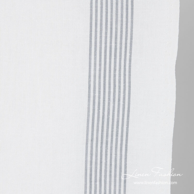 Thin grey striped edge of toweling fabric