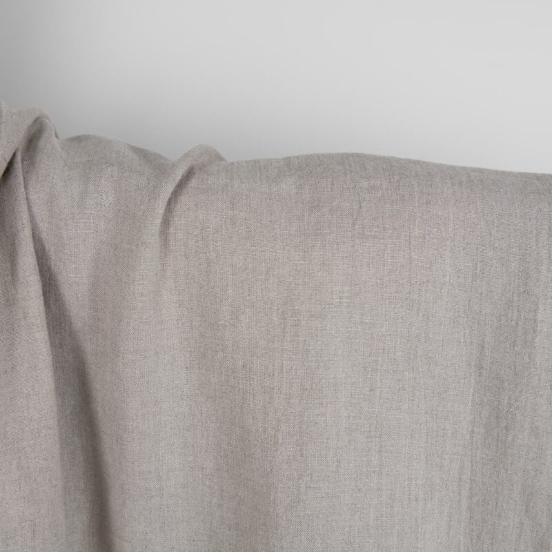 Washed linen fabric in natural grey close up detail