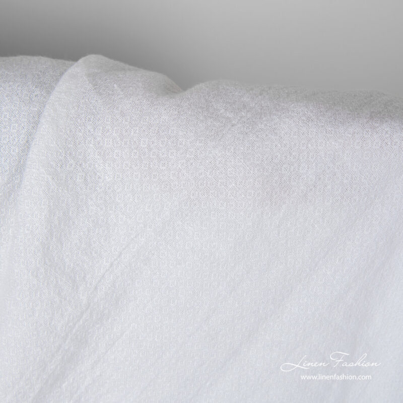 Snow white linen fabric with small square pattern, washed