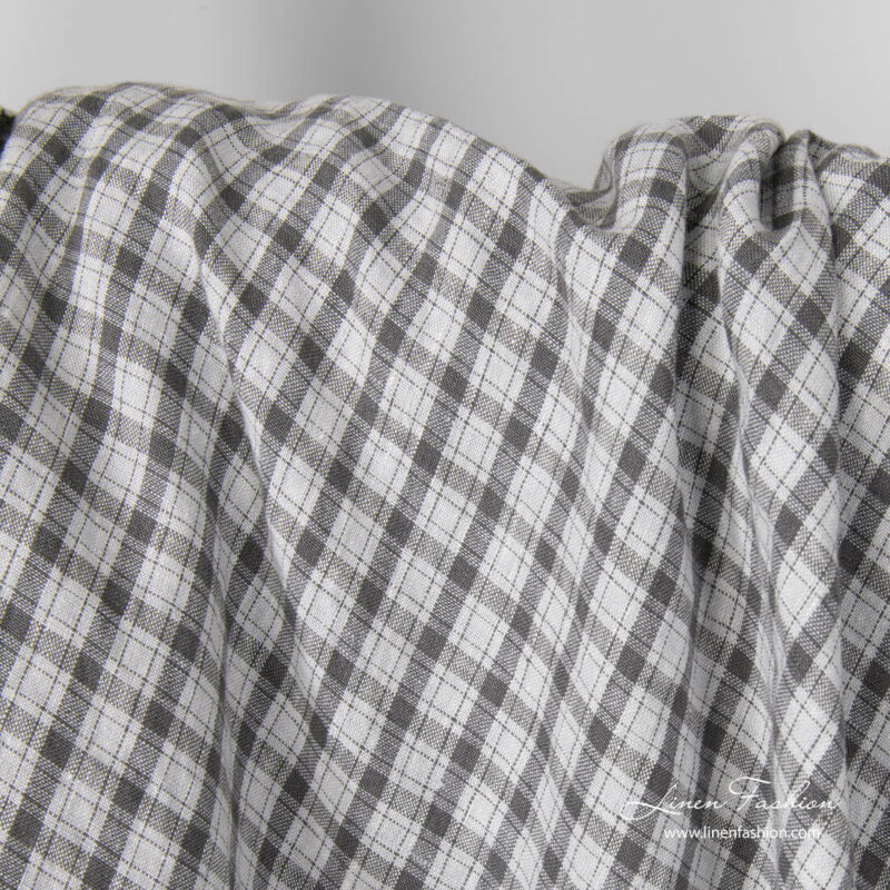 Light grey linen fabric with dark grey checks, washed