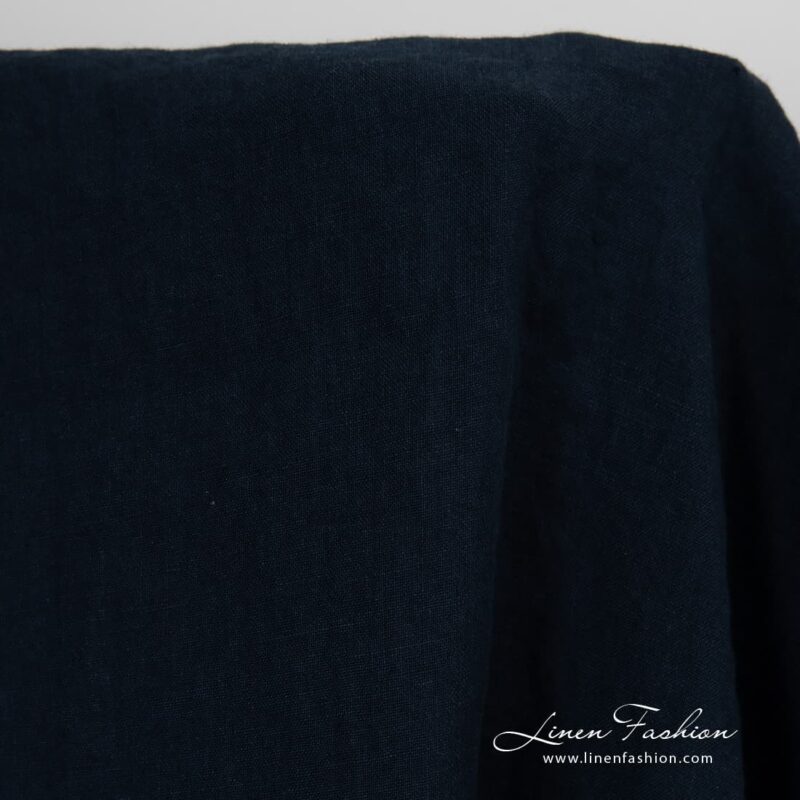 Washed linen fabric in blue black colour.