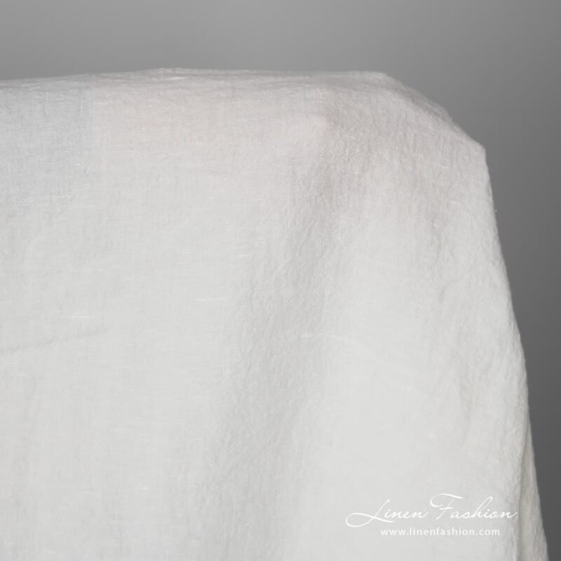 Washed linen fabric in off-white is 285cm (112”) width