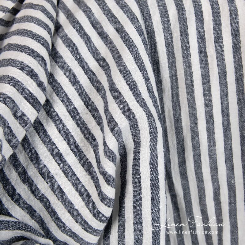 Wide linen fabric in blue stripes, specially washed to increase softness