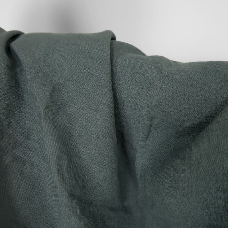 Washed linen fabric in balsam green colour, specially washed