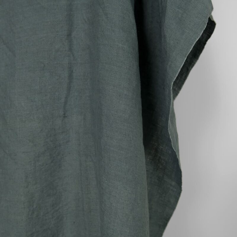Washed linen fabric in balsam green colour, plain weave