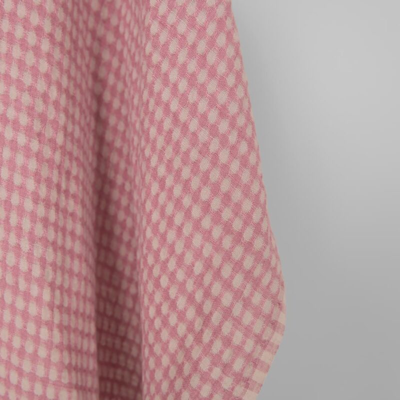 Washed linen fabric in greyish lilac structural weave pattern