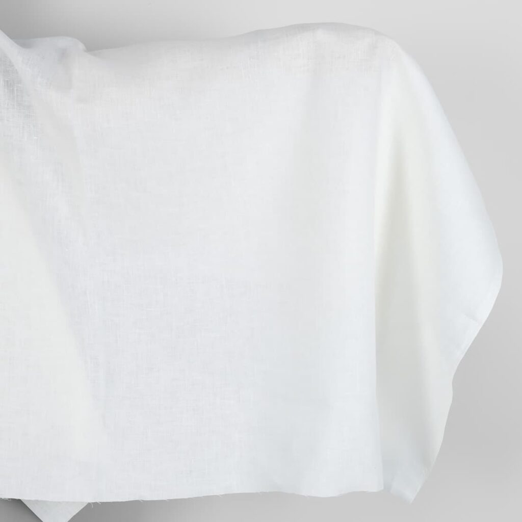 Linen fabric in plain off-white colour