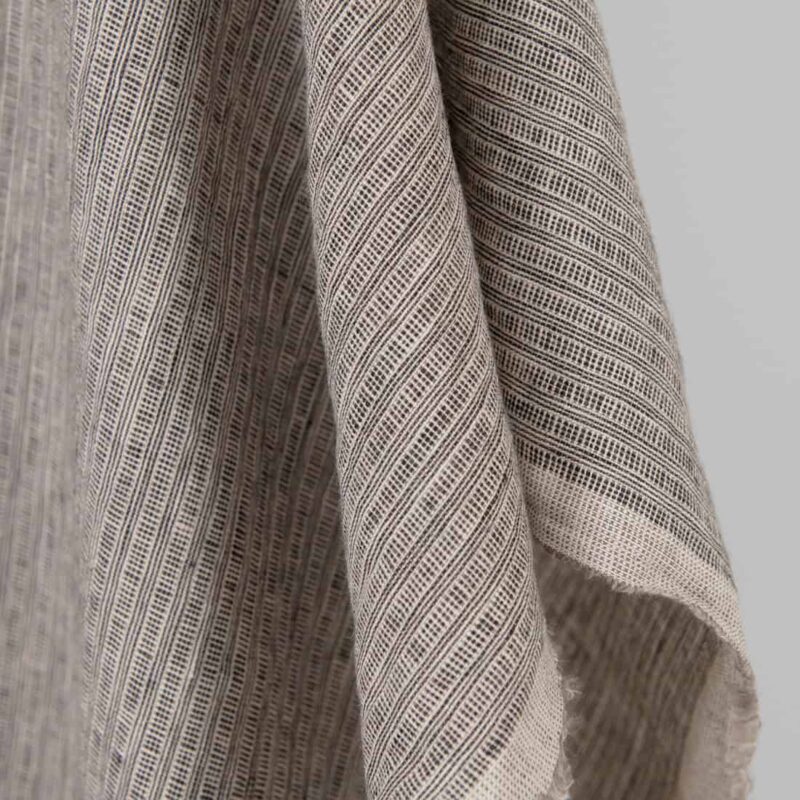 Washed linen fabric pink-black small striped pattern, fabric edge