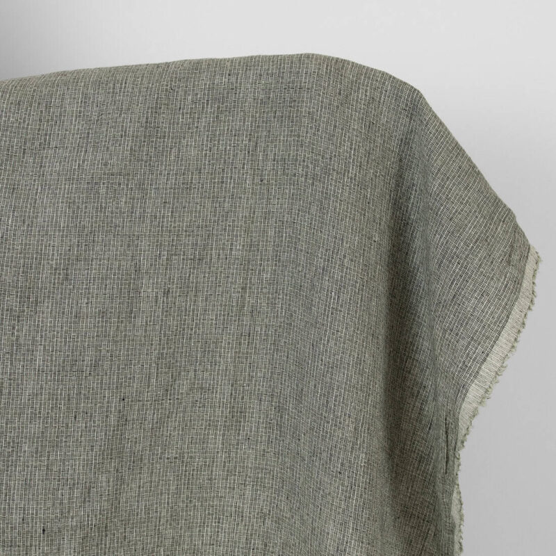 Washed linen fabric green-black small pattern