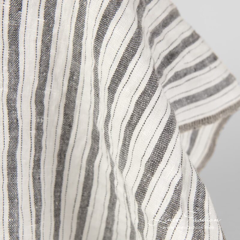 100% washed linen fabric with stripes.