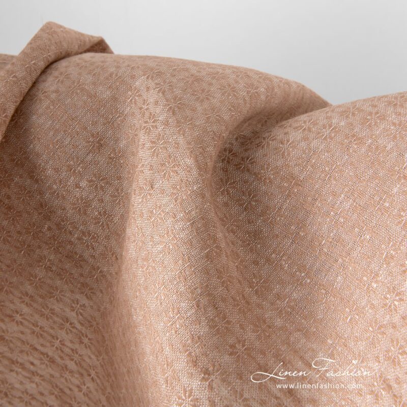 Light brown linen fabric with small flower pattern