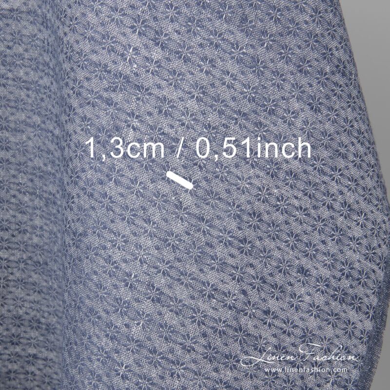 Linen fabric with small blue flowers