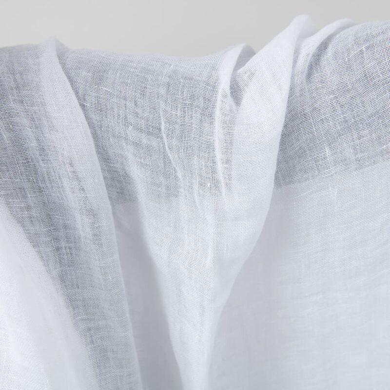 Bright white transparent linen fabric washed close up detail