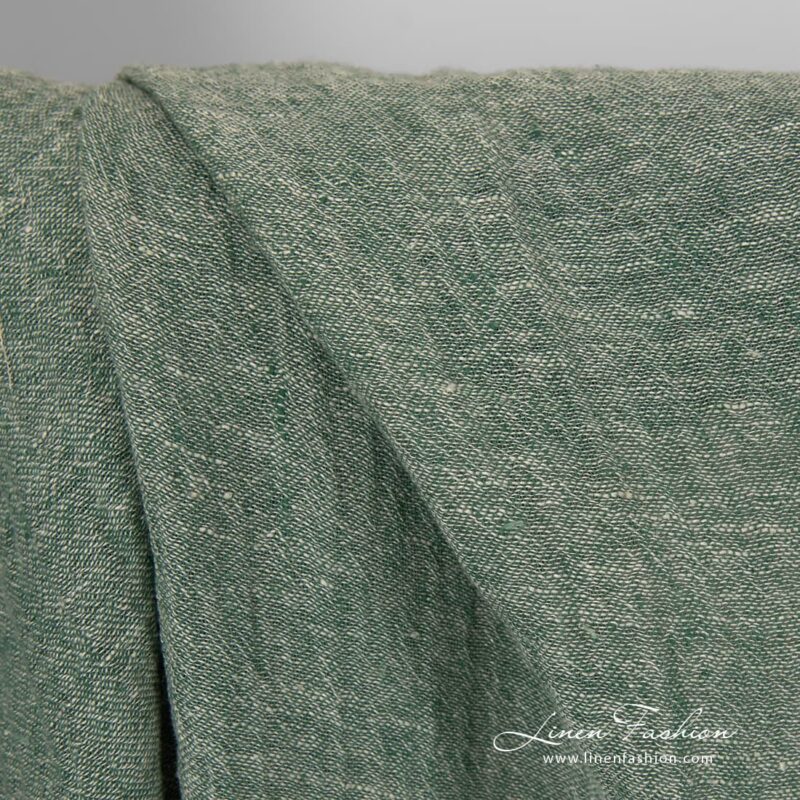 Transparent linen fabric in green colour.