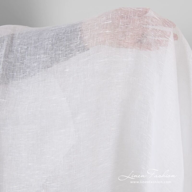 Transparent linen fabric in optical white color for curtains, shawls and scarves