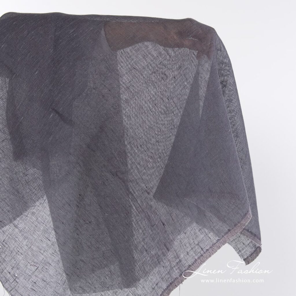 Linen fabric in dusty plum colour.