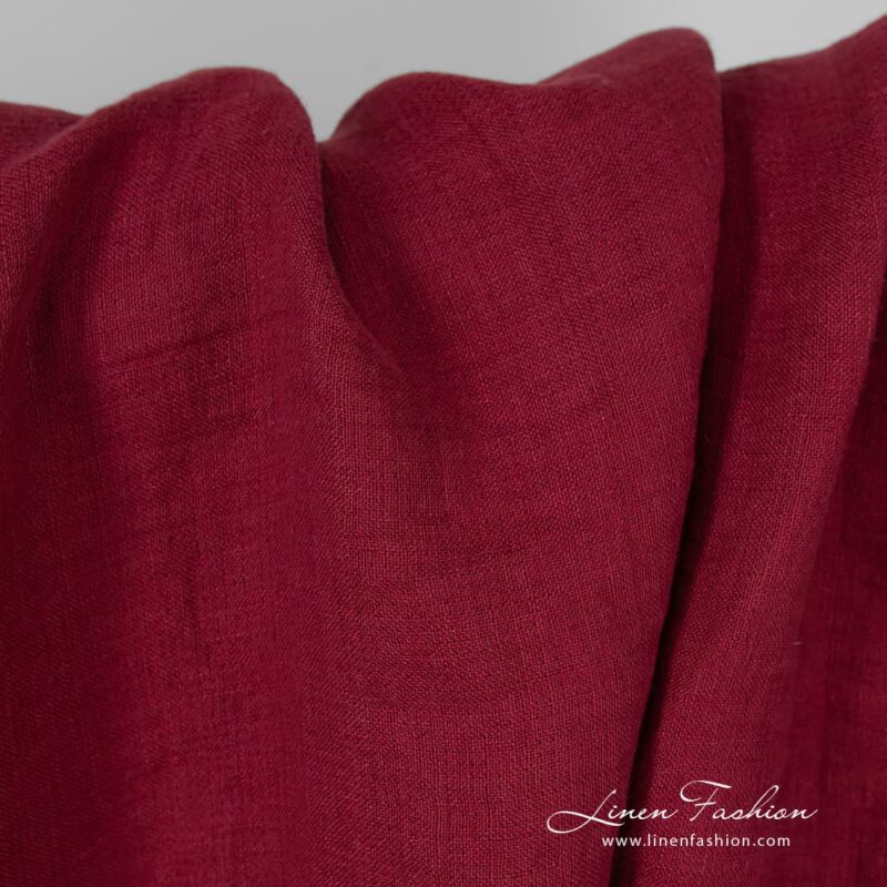 Washed raspberry coloured linen fabric.