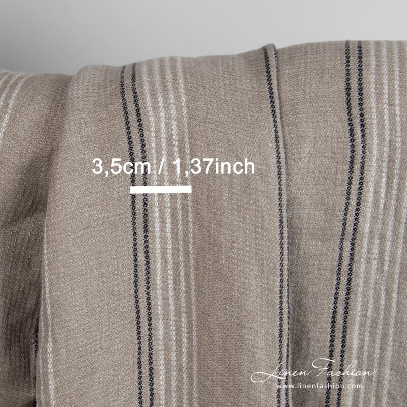 Linen fabric woven from greyish brown, white and black yarns