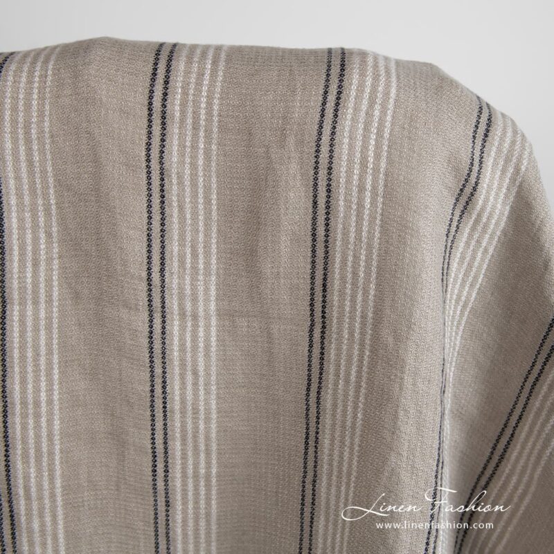 Grey brown linen fabric in stripes, specially washed to increase softness