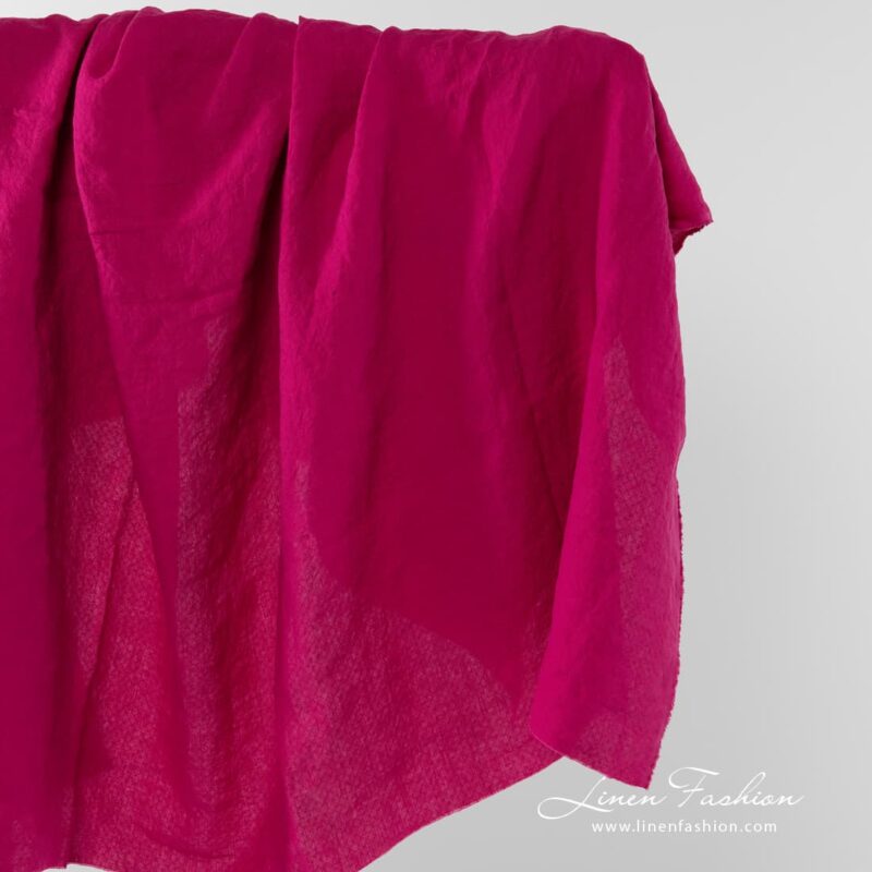 Linen fabric in bold berry colour.