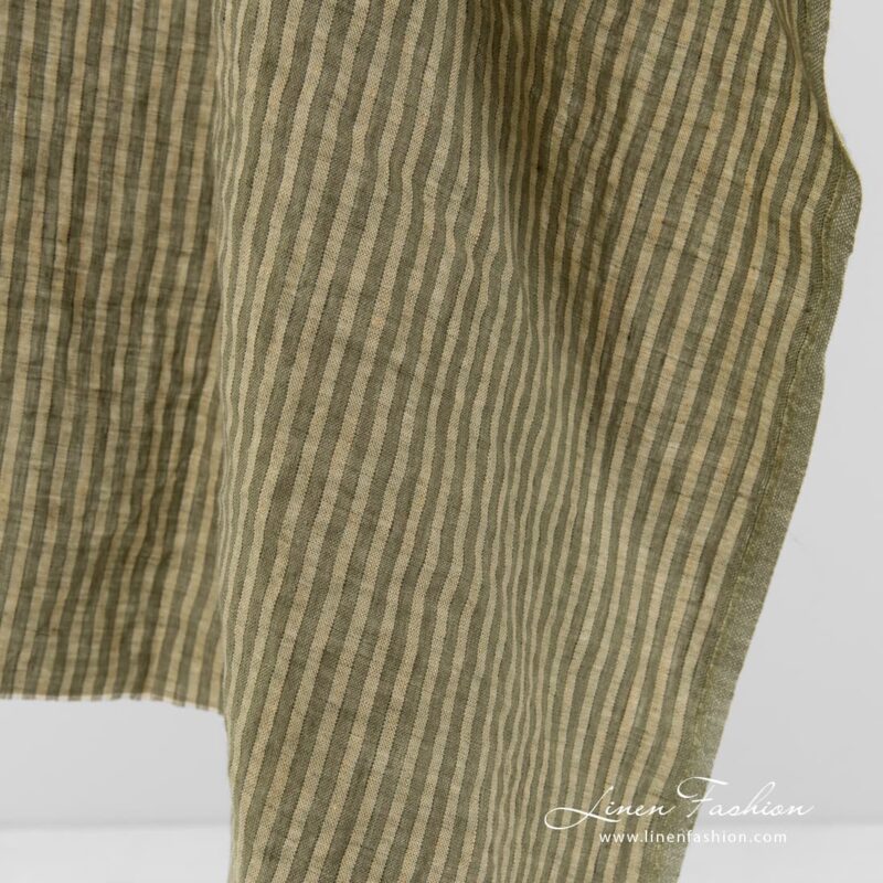 Washed linen fabric in green stripes.
