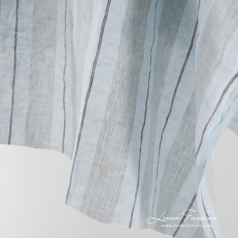 Washed linen fabric in pale blue.