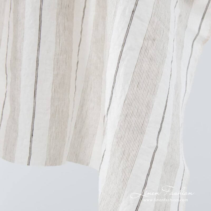 Washed 100% linen fabric in white colour.