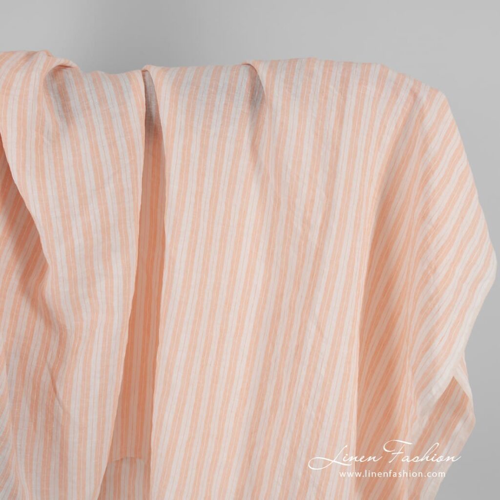 Striped linen fabric in peach color