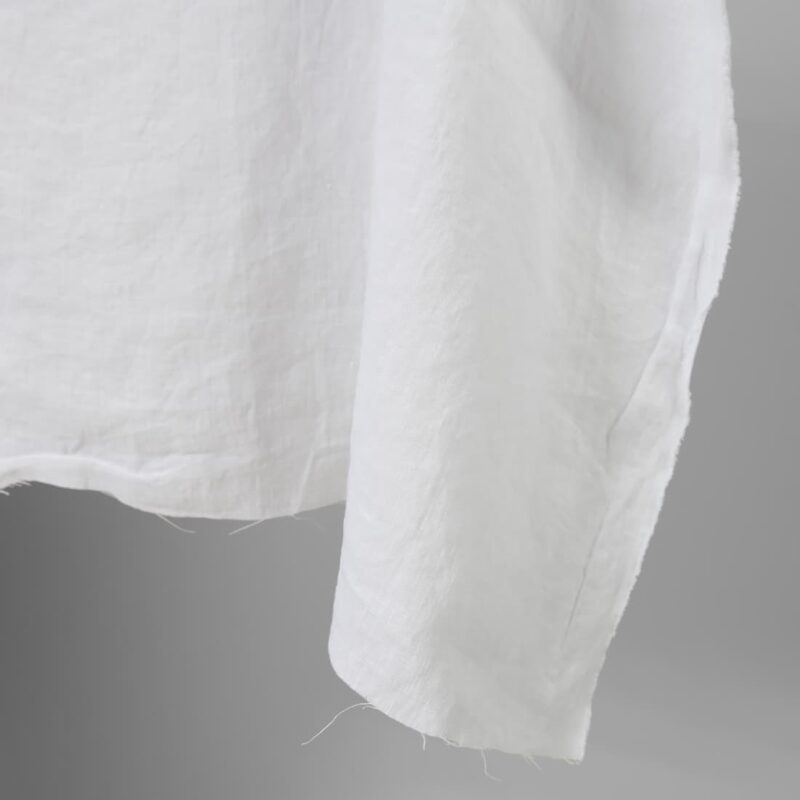 Linen washed fabric optic white colour edge view photo