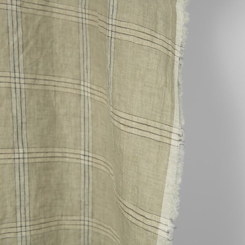 Washed linen fabric green-beige checks, fabric edge