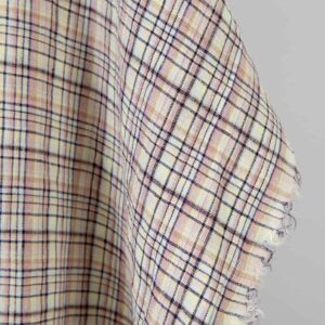 Washed linen fabric pastel multicolour and dark blue checks, fabric edge