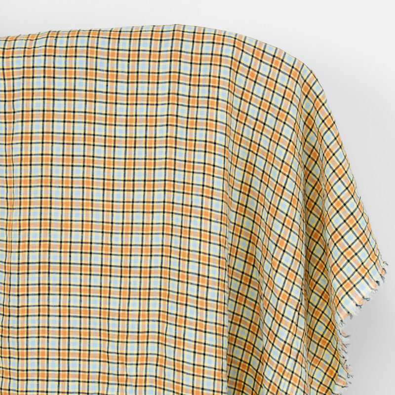 Leinenstoff orange und blassblau kariert, gewaschen
