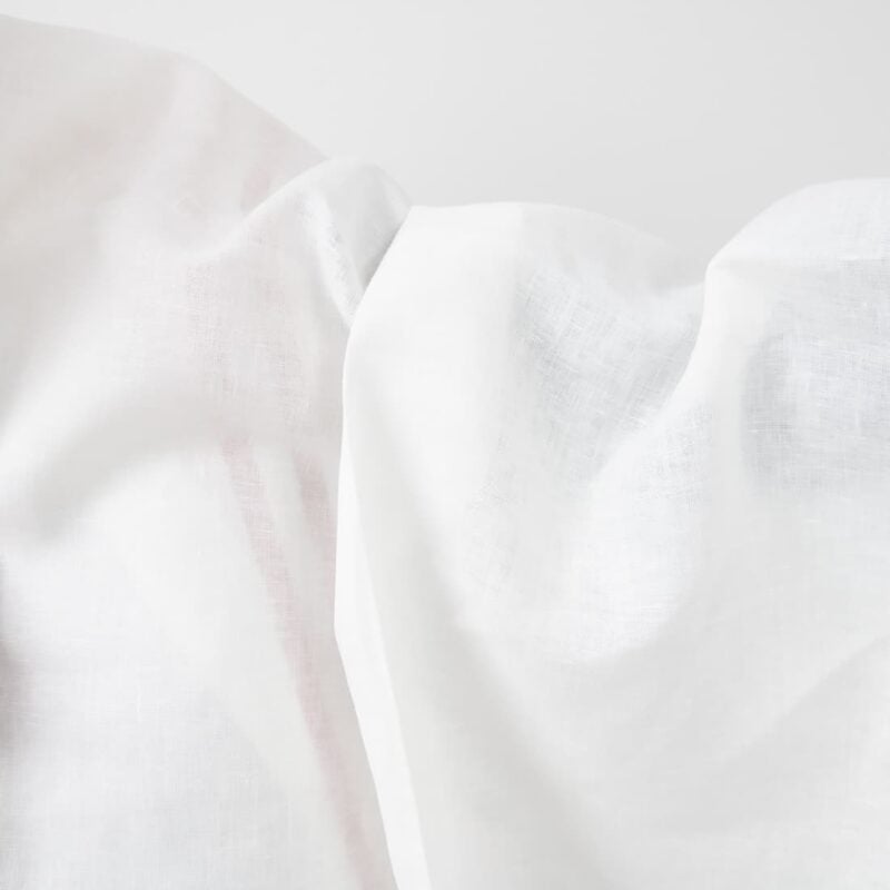 White linen fabric with red lines texture