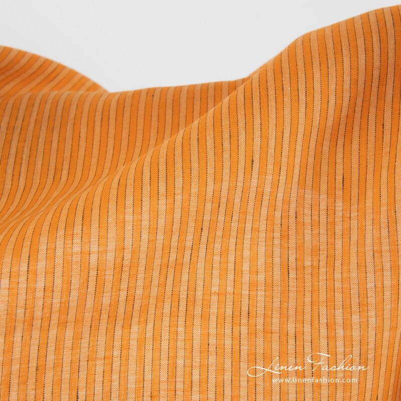 Linen fabric in orange colour.