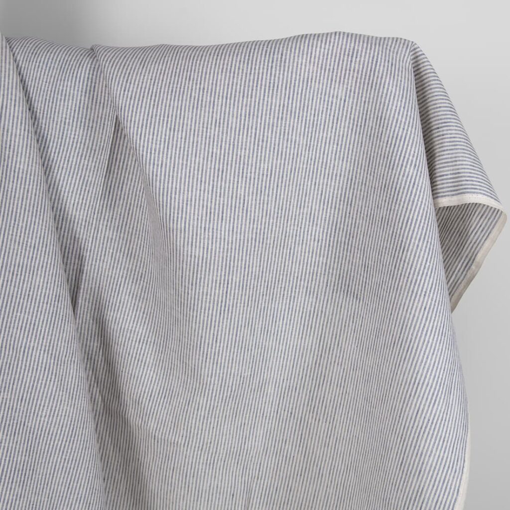 Linen fabric in blue and brownish colour stripes