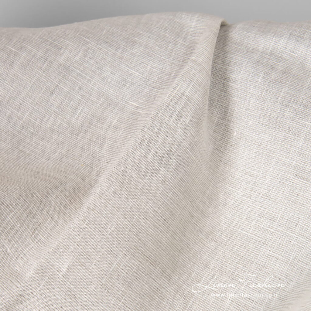 Breiter Leinenstoff mit naturgrauen Karos 2 Linen fabric in natural grey and white melange mix