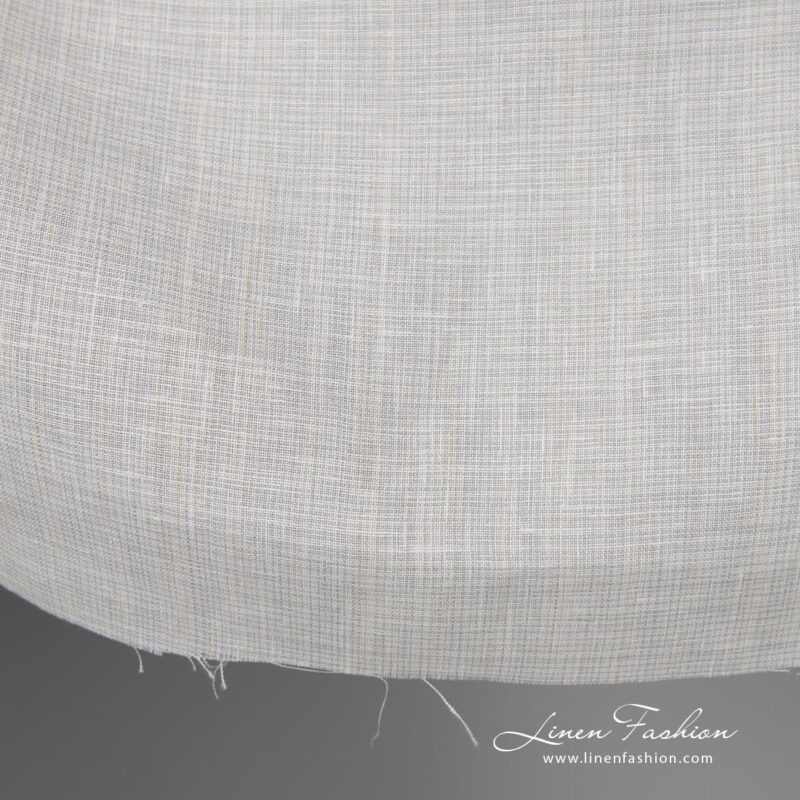 Wide linen fabric greyish white colour edge view