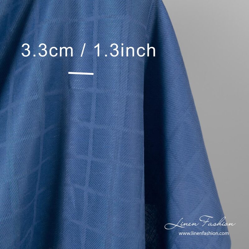 Blue jacquard linen cotton blend fabric woven in diagonal lines